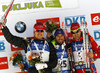 Emil Hegle Svendsen of Norway (L), winner Jean Guillaume Beatrix of France (M) and Ole Einar Bjoerndalen of Norway celebrates their medals won in the Men mass start race of IBU Biathlon World Cup in Pokljuka, Slovenia. Men mass start race of IBU Biathlon World cup was held on Sunday, 20th of December 2015 in Pokljuka, Slovenia.
