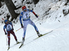 Kaisa Makarainen of Finland (R) and Olga Podchufarova of Russia skiing during the Women mass start race of IBU Biathlon World Cup in Pokljuka, Slovenia. Women mass start race of IBU Biathlon World cup was held on Sunday, 20th of December 2015 in Pokljuka, Slovenia.
