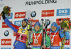 Martin Fourcade, Erik Lesser, Evgeniy Garanichev celebrates on podium during the winner presentation after the men 15 km Mass Start of Rubolding BMW IBU Biathlon World Cup at the Biathlonarena in Ruhpolding, Germany on 2016/01/16.

