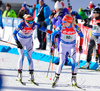 Mari Laukkanen (L) and Kaisa Makarainen of Finland (R) during exchange during mixed relay race of IBU Biathlon World Cup in Canmore, Alberta, Canada. Mixed relay race of IBU Biathlon World cup was held in Canmore, Alberta, Canada, on Sunday, 7th of February 2016.
