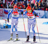 Kaisa Makarainen and Attu Toivanen of Finland during exchange during mixed relay race of IBU Biathlon World Cup in Canmore, Alberta, Canada. Mixed relay race of IBU Biathlon World cup was held in Canmore, Alberta, Canada, on Sunday, 7th of February 2016.
