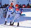 Anti Toivanen (L) and Tuomas Ironman of Finland (R) during last exchange during mixed relay race of IBU Biathlon World Cup in Canmore, Alberta, Canada. Mixed relay race of IBU Biathlon World cup was held in Canmore, Alberta, Canada, on Sunday, 7th of February 2016.
