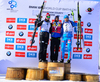 Winner Martin Fourcade of France (M), second placed Johannes Thingnes Boe of Norway (L) and third placed Anton Shipulin of Russia (R) celebrate their medals won in the during men pursuit race of IBU Biathlon World Cup in Presque Isle, Maine, USA. Men pursuit race of IBU Biathlon World cup was held in Presque Isle, Maine, USA, on Friday, 12th of February 2016.
