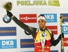 Winner Martin Fourcade of France celebrates his victory in the men sprint race of IBU Biathlon World Cup in Pokljuka, Slovenia. Women sprint race of IBU Biathlon World cup was held in Pokljuka, Slovenia, on Friday, 9th of December 2016.
