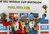 Winner Martin Fourcade of France (M), second placed Johannes Thingnes Boe of Norway (L) and third placed Anton Shipulin of Russia (R) celebrate their medals won in the men sprint race of IBU Biathlon World Cup in Pokljuka, Slovenia. Women sprint race of IBU Biathlon World cup was held in Pokljuka, Slovenia, on Friday, 9th of December 2016.
