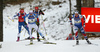 Kaisa Makarainen of Finland (L) and Marte Olsbu of Norway (R) leading chasing group during the women pursuit race of IBU Biathlon World Cup in Pokljuka, Slovenia. Women pursuit race of IBU Biathlon World cup was held in Pokljuka, Slovenia, on Friday, 9th of December 2016.
