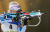 Kaisa Makarainen of Finland shooting during the women pursuit race of IBU Biathlon World Cup in Pokljuka, Slovenia. Women pursuit race of IBU Biathlon World cup was held in Pokljuka, Slovenia, on Friday, 9th of December 2016.
