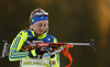 Emma Nilsson of Sweden getting ready for shooting during the women pursuit race of IBU Biathlon World Cup in Pokljuka, Slovenia. Women pursuit race of IBU Biathlon World cup was held in Pokljuka, Slovenia, on Friday, 9th of December 2016.
