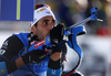 Martin Fourcade of France getting ready for shooting during the men relay race of IBU Biathlon World Cup in Pokljuka, Slovenia.  Men relay race of IBU Biathlon World cup was held in Pokljuka, Slovenia, on Sunday, 11th of December 2016.
