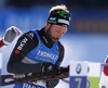 Serafin Wiestner of Switzerland  getting ready for shooting during the men relay race of IBU Biathlon World Cup in Pokljuka, Slovenia.  Men relay race of IBU Biathlon World cup was held in Pokljuka, Slovenia, on Sunday, 11th of December 2016.
