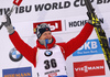 Winner Johannes Thingnes Boe of Norway celebrates his medal won in the men 10km sprint race of IBU Biathlon World Cup in Hochfilzen, Austria.  Men 10km sprint race of IBU Biathlon World cup was held in Hochfilzen, Austria, on Friday, 8th of December 2017.
