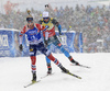 Johannes Thignes Boe of Norway and Martin Fourcade of France during the men 12.5km pursuit race of IBU Biathlon World Cup in Hochfilzen, Austria.  Men 12.5km pursuit race of IBU Biathlon World cup was held in Hochfilzen, Austria, on Saturday, 9th of December 2017.
