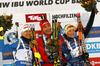 Second placed Kaisa Makarainen of Finland (L), winner Anastasiya Kuzmina of Slovakia (M) and third placed Darya Domracheva of Belarus (R) celebrates their medals won in women 10km pursuit race of IBU Biathlon World Cup in Hochfilzen, Austria.  Women 10km pursuit race of IBU Biathlon World cup was held in Hochfilzen, Austria, on Saturday, 9th of December 2017.
