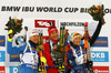 Second placed Kaisa Makarainen of Finland (L), winner Anastasiya Kuzmina of Slovakia (M) and third placed Darya Domracheva of Belarus (R) celebrates their medals won in women 10km pursuit race of IBU Biathlon World Cup in Hochfilzen, Austria.  Women 10km pursuit race of IBU Biathlon World cup was held in Hochfilzen, Austria, on Saturday, 9th of December 2017.
