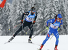 Serafin Wiestner of Switzerland (L) and Thomas Bormolini of Italy (R) during the men relay race of IBU Biathlon World Cup in Hochfilzen, Austria.  Men relay race of IBU Biathlon World cup was held in Hochfilzen, Austria, on Sunday, 10th of December 2017.
