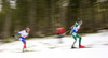 Lisa Vittozzi of Italy (R) and Paulina Fialkova of Slovakia (L) skiing during the mixed relay race of IBU Biathlon World Cup in Pokljuka, Slovenia. Opening race of IBU Biathlon World cup 2018-2019, single mixed relay was held in Pokljuka, Slovenia, on Sunday, 2nd of December 2018.
