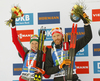 Second placed team Simon Eder of Austria and Lisa Theresa Hauser of Austria (R) celebrate their medals won in the mixed relay race of IBU Biathlon World Cup in Pokljuka, Slovenia. Opening race of IBU Biathlon World cup 2018-2019, single mixed relay was held in Pokljuka, Slovenia, on Sunday, 2nd of December 2018.
