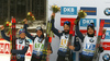Second placed team of Switzerland Elisa Gasparin, Lena Haecki, Benjamin Weger and Jeremy Finello celebrate their medals won in the mixed relay race of IBU Biathlon World Cup in Pokljuka, Slovenia. Opening race of IBU Biathlon World cup 2018-2019, single mixed relay was held in Pokljuka, Slovenia, on Sunday, 2nd of December 2018.
