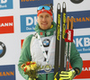 Second placed Johannes Kuehn of Germany celebrates on the podium after the men individual race of IBU Biathlon World Cup in Pokljuka, Slovenia. Men 20km individual race of IBU Biathlon World cup 2018-2019 was held in Pokljuka, Slovenia, on Thursday, 6th of December 2018.
