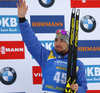  Third placed Alexander Loginov of Russia celebrates on the podium after the men sprint race of IBU Biathlon World Cup in Pokljuka, Slovenia. Men sprint race of IBU Biathlon World cup 2018-2019 was held in Pokljuka, Slovenia, on Friday, 7th of December 2018.
