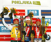 Winner Kaisa Makarainen of Finland (M), second placed Dorothea Wierer of Italy  (L) and  third placed (R) celebrate their medals won in the women pursuit race of IBU Biathlon World Cup in Pokljuka, Slovenia. Women pursuit race of IBU Biathlon World cup 2018-2019 was held in Pokljuka, Slovenia, on Sunday, 9th of December 2018.
