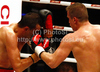 Denis Simcic of Slovenia and Istvan Varga of Romunia during WBF International boxing match. WBF International boxing match between Simcic and Varga was held on 4th of September 2010 in Stozice Arena in Ljubljana, Slovenia.
