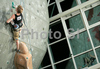 Jakob Schubert of Austria climbing during men finals of last IFSC Sport Climbing World cup of 2008 season. Final race of IFSC Sport Climbing World Cup of 2008 season was held in Kranj, Slovenia on 16th of November 2008. 
