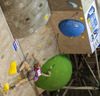 Jessica Pilz of Austria climbing during finals of IFSC Climbing World cup in Kranj, Slovenia. IFSC Climbing World cup finals were held in Zlato Polje Arena in Kranj, Slovenia, on Sunday, 16th of November 2014.
