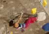 Third placed Akiyo Noguchi of Japan climbing during finals of IFSC Climbing World cup in Kranj, Slovenia. IFSC Climbing World cup finals were held in Zlato Polje Arena in Kranj, Slovenia, on Sunday, 16th of November 2014.
