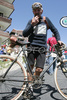 Acrobat on the bike before the start of the 16th stage from Cuneo (ITA) to Jausiers  (FRA) of Tour de France. The stage was held on 22nd of July, 2008 and it was 157 km long.
