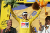 Carlos Sastre (Spa, CSC-Saxo Bank) in yellow jersey as the best in general classification at the podium of the 17th stage from Embrun to L Alpe-d Huez of Tour de France. The stage was held on 23rd of July, 2008 and it was 210,5 km long.
