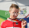 Second placed Patrick Gretsch of Germany celebrating his medal won in U23 time trial race of UCI Road Cycling World Championships in Varese, Italy. U23 time trial of UCI Road cycling World Championships was held in Varese, Italy, on Tuesday 23rd of September 2008.
