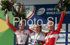 Winner Amber Neben of USA (M), second placed Christiane Soeder of Austria (L) and third placed Judith Arndt of Germany (R) celebrating their medals won in Women elite time trial race of UCI Road Cycling World Championships in Varese, Italy. Women elite time trial of UCI Road cycling World Championships was held in Varese, Italy, on Wednesday 24th of September 2008.
