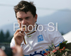 Winner Bert Grabsch of Germany celebrating his medal won in Men elite time trial race of UCI Road Cycling World Championships in Varese, Italy. Men elite time trial of UCI Road cycling World Championships was held in Varese, Italy, on Thursday 25th of September 2008.
