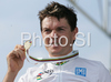 Winner Bert Grabsch of Germany celebrating his medal won in Men elite time trial race of UCI Road Cycling World Championships in Varese, Italy. Men elite time trial of UCI Road cycling World Championships was held in Varese, Italy, on Thursday 25th of September 2008.
