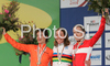 Winner Nicole Cooke of Great Britain (M), second placed Marianne Vos of Netherlands (L) and third placed Trixi Worrack of Germany (R) celebrate their medals won in Women elite road race of UCI Road Cycling World Championships in Varese, Italy. Women Elite road race of UCI Road cycling World Championships was held in Varese, Italy, on Saturday 27th of September 2008.
