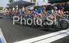 Riders crossing finish line entering last lap during Men elite road race of UCI Road Cycling World Championships in Varese, Italy. Men Elite road race of UCI Road cycling World Championships was held in Varese, Italy, on Sunday 28th of September 2008.
