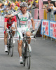 Winner Danilo Di Luca of Italy (LPR Brakes - Farnese Vini) celebrates his victory in fourth stage of 92nd Giro d Italia. Fourth stage of 92nd Giro d Italia in length of 162km was held on 12th of May 2009, and was leading riders from  Padova, Italy to San Martino di Castrozza, Italy.
