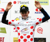 Jakob Fuglsang of Denmark (Team Saxo Bank) in polka dot jersey as the best cyclist in mountain classification at the flower ceremony of the third stage of Tour de Slovenie 2009 from Lenart to Krvavec. The third stage was 177 km long and it was held on Sunday, 20th of June, 2009.
