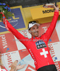 Winner Fabian Cancellara of Switzerland (Team Saxo Bank) at the flower ceremony after the individual time trial in the first stage of Tour de France (15,5 km).  The individual time trial was held on Saturday, 4th of july in Monaco.  <br> 
