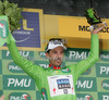 Fabian Cancellara of Switzerland (Team Saxo Bank) in green jersey at the flower ceremony after the individual time trial in the first stage of Tour de France (15,5 km).  The individual time trial was held on Saturday, 4th of july in Monaco.  <br> 
