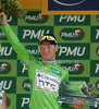 Mark Cavendish of Great Britain (Team Columbia High Road) in green jersey as the best rider in points classification at the flower ceremony of the second stage of Tour de France from Monaco to Brignoles (187 km).  The second stage was held on Sunday, 5th of July.  <br> 

