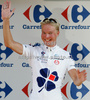 Jussi Veikkanen of Finland (Francaise des Jeux) in polka dot jersey as the best rider in mountain classification at the flower ceremony of the second stage of Tour de France from Monaco to Brignoles (187 km).  The second stage was held on Sunday, 5th of July.  <br> 
