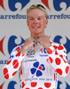 Jussi Veikkanen of Finland (Francaise des Jeux) in polka dot jersey as the best rider in mountain classification at the flower ceremony of the second stage of Tour de France from Monaco to Brignoles (187 km).  The second stage was held on Sunday, 5th of July.  <br> 
