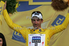 Fabian Cancellara of Switzerland (Team Saxo Bank) in yelllow jersey as the best rider in general classification at the flower ceremony of the third stage of Tour de France from Marseille to Le Grande Motte (196,5 km).  The third stage was held on Monday, 6th of July.  <br> 

