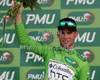Mark Cavendish of Great Britain (Team Columbia High Road) in green jersey as the best rider in points classification at the flower ceremony of the third stage of Tour de France from Marseille to Le Grande Motte (196,5 km).  The third stage was held on Monday, 6th of July.  <br> 
