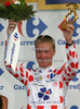 Jussi Veikkanen of Finland (Francaise des Jeux) in polka dot jersey as the best rider in mountain classification at the flower ceremony of the third stage of Tour de France from Marseille to Le Grande Motte (196,5 km).  The third stage was held on Monday, 6th of July.  <br> 

