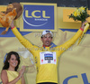 Fabian Cancellara of Switzerland (Team Saxo Bank) in yellow jersey as the best rider in general classification at the flower ceremony of the team time trial of the fourth stage of Tour de France from Montpellier to Montpellier (39 km).  The fourth stage was held on Tuesday, 7th of July.  <br> 
