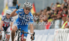 Third placed Noemi Cantele of Italy celebrating when crossing finish line in Women Elite UCI Road cycling World Championships road race in Mendrisio, Switzerland. 124.2km long Women Elite road race was held in Mendrisio, Switzerland, on 26th of September 2009.
