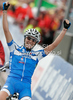 Winner Tatiana Guderzo of Italy celebrating her victory when crossing finish line of Women Elite UCI Road cycling World Championships road race in Mendrisio, Switzerland. 124.2km long Women Elite road race was held in Mendrisio, Switzerland, on 26th of September 2009.
